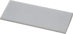 Norton - 4" Long x 1-3/4" Diam x 3/8" Thick, Novaculite Sharpening Stone - Round, Ultra Fine Grade - Exact Industrial Supply