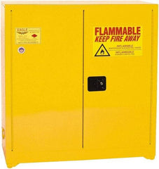 Eagle - 2 Door, 3 Shelf, Yellow Steel Standard Safety Cabinet for Flammable and Combustible Liquids - 44" High x 43" Wide x 18" Deep, Manual Closing Door, 3 Point Key Lock, 40 Gal Capacity - Exact Industrial Supply