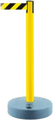 Tensator - 38" High, 2-1/2" Pole Diam, Barricade Tape Dispenser - 14" Base Diam, Round Plastic Base, Yellow Polymer Post, 7-1/2' x 1-7/8" Tape, Single Line Tape, For Outdoor Use - Exact Industrial Supply