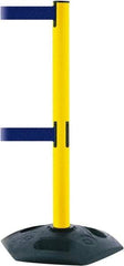 Tensator - 38" High, 2-1/2" Pole Diam, 4 Way Stanchion - 19" Base Diam, Octagon Recycled Rubber Base, Yellow Plastic Post, 7-1/2' x 2" Tape, Dual Line Tape, For Outdoor Use - Exact Industrial Supply