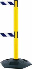 Tensator - 38" High, 2-1/2" Pole Diam, 4 Way Stanchion - 19" Base Diam, Octagon Recycled Rubber Base, Yellow Plastic Post, 7-1/2' x 2" Tape, Dual Line Tape, For Outdoor Use - Exact Industrial Supply