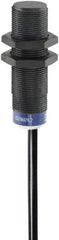 Telemecanique Sensors - NPN, PNP, 12mm Detection, Cylinder, Inductive Proximity Sensor - 2 Wires, IP68, IP69, 24 to 240 VAC @ 50/60 Hz, 24 to 240 VDC, M18x1 Thread, 60mm Long - Exact Industrial Supply