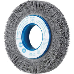 PFERD - Wheel Brushes; Outside Diameter (Inch): 6 ; Wire Type: Crimped; Round ; Fill Material: Nylon; Silicon Carbide ; Trim Length (Inch): 1-1/4 ; Filament Wire Diameter Range: 0.0200-0.0299 ; Maximum RPM: 3600.000 - Exact Industrial Supply