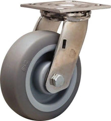 Hamilton - 6" Diam x 2" Wide x 7-1/2" OAH Top Plate Mount Swivel Caster - Rubber Mold on Polyolefin, 410 Lb Capacity, Delrin Bearing, 3-3/4 x 4-1/2" Plate - Exact Industrial Supply