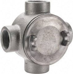 Thomas & Betts - (4) 1-1/4" Knockouts, Iron Round GUAX - 4.38" Overall Width x 2.69" Overall Depth - Exact Industrial Supply