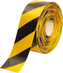 PRO-SAFE - Black & Yellow Striped PVC Tape - 4" Wide x 100' Long x 50 mil Thick, General Traffic - Exact Industrial Supply