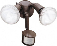 Cooper Lighting - 2 Head, 70 Ft. Detection, 180° Angle, PAR Lamp Motion Sensing Light Fixture - 120 Volt, 300 Watt, Metal Bronze Housing, Wall, Eave Mounted - Exact Industrial Supply