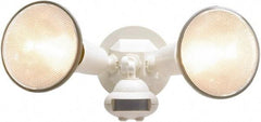 Cooper Lighting - 2 Head, 60 Ft. Detection, 110° Angle, PAR38 Lamp Motion Sensing Light Fixture - 120 Volt, 300 Watt, Plastic White Housing, Wall, Eave Mounted - Exact Industrial Supply