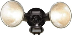 Cooper Lighting - 2 Head, 60 Ft. Detection, 110° Angle, PAR38 Lamp Motion Sensing Light Fixture - 120 Volt, 300 Watt, Plastic Black Housing, Wall, Eave Mounted - Exact Industrial Supply