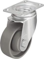 Blickle - 3-1/2" Diam x 1-1/4" Wide x 4-11/16" OAH Top Plate Mount Swivel Caster - Impact-Resistant Nylon, 400 Lb Capacity, Ball Bearing, 3-5/8 x 2-1/2" Plate - Exact Industrial Supply