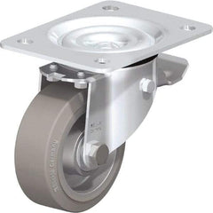 Blickle - 4" Diam x 1-37/64" Wide x 5-7/64" OAH Top Plate Mount Swivel Caster with Brake - Solid Rubber, 440 Lb Capacity, Ball Bearing, 5-1/2 x 4-3/8" Plate - Exact Industrial Supply