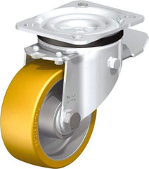 Blickle - 4" Diam x 1-9/16" Wide x 5-7/64" OAH Top Plate Mount Swivel Caster with Brake - Polyurethane-Elastomer Blickle Extrathane, 550 Lb Capacity, Ball Bearing, 3-15/16 x 3-3/8" Plate - Exact Industrial Supply