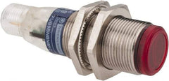 Telemecanique Sensors - 4 Pin M12 Connector, 2m Nominal Distance, Shock and Vibration Resistant, Polarized Retroreflective Photoelectric Sensor - 12 to 24 VDC, 500 Hz, Nickel Plated Brass, 2.44 Inch Long x 0.71 Inch Wide - Exact Industrial Supply