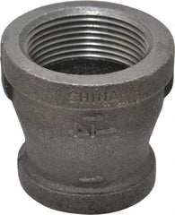 B&K Mueller - Size 1-1/4 x 1", Class 150, Malleable Iron Black Pipe Reducing Coupling - 150 psi, Threaded End Connection - Exact Industrial Supply