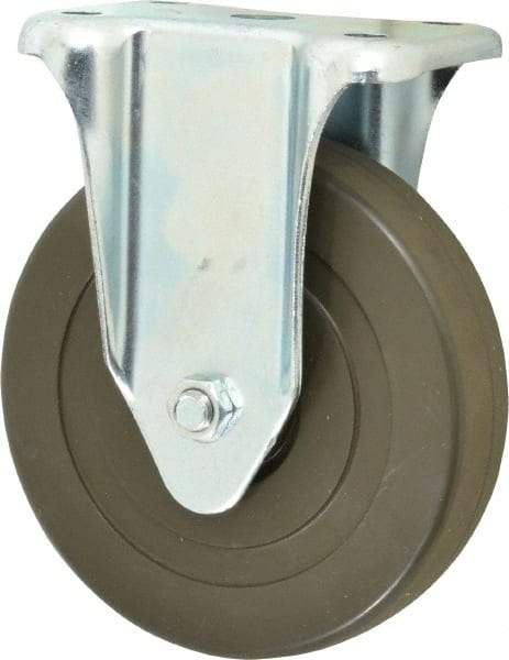 Albion - 5" Diam x 1-1/4" Wide x 6-15/32" OAH Top Plate Mount Rigid Caster - Hard Rubber, 290 Lb Capacity, Self-Lubricating Bearing, 2-7/8 x 3-5/8" Plate - Exact Industrial Supply