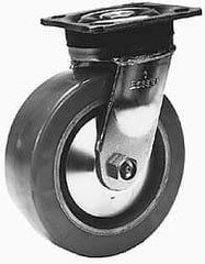 Albion - 4" Diam x 2" Wide x 5-5/8" OAH Top Plate Mount Rigid Caster - Phenolic, 800 Lb Capacity, Roller Bearing, 4 x 4-1/2" Plate - Exact Industrial Supply