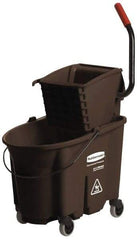 Rubbermaid - 35 Qt Plastic Bucket & Wringer - 20-1/8" Long x 36-1/2" High x 15-3/4" Wide, Brown - Exact Industrial Supply