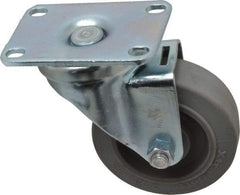 Albion - 3-1/2" Diam x 1-1/4" Wide x 4-1/4" OAH Top Plate Mount Swivel Caster - Rubber, 250 Lb Capacity, Ball Bearing, 2-1/2 x 3-5/8" Plate - Exact Industrial Supply