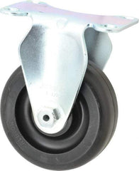 Albion - 3-1/2" Diam x 1-1/4" Wide x 4-11/16" OAH Top Plate Mount Rigid Caster - Polyolefin, 300 Lb Capacity, Delrin Bearing, 2-1/2 x 3-5/8" Plate - Exact Industrial Supply