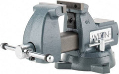 Wilton - 4" Jaw Width x 4-1/2" Jaw Opening Capacity, 3-7/16" Throat Depth, Bench & Pipe Combination Vise - 1/4 to 2" Pipe Capacity, Swivel Base, Bolt Down Attachment, Ductile Iron - Exact Industrial Supply